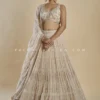 Imperial Charm: Exclusive Champagne Lehenga Choli With Handwork -Indian Wear Shop ImperialCharmExclusiveChampagneLehengaCholiwithHandwork 5 scaled