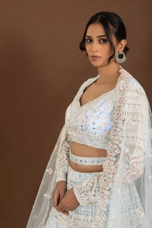 Regal Glam: Powder Blue Designer Lehenga Choli With Mirror And Pearl Work -Indian Wear Shop RegalGlamPowderBlueDesignerLehengaCholiwithMirrorandPearlWork 1 7b476572 315d 415d bb6d a5c772bb71b2 scaled
