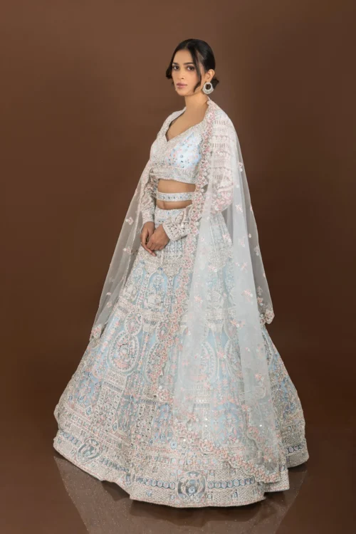 Regal Glam: Powder Blue Designer Lehenga Choli With Mirror And Pearl Work -Indian Wear Shop RegalGlamPowderBlueDesignerLehengaCholiwithMirrorandPearlWork 2 090e153f 50e2 47ce 9ddb ff56c19359eb scaled